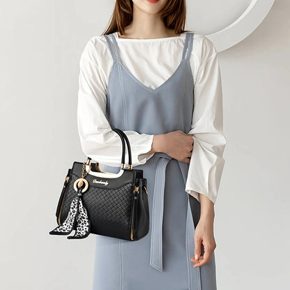Elegant Black Tote Bag with Golden-Tone